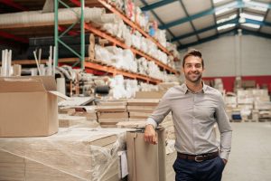 Man smiling in warehouse